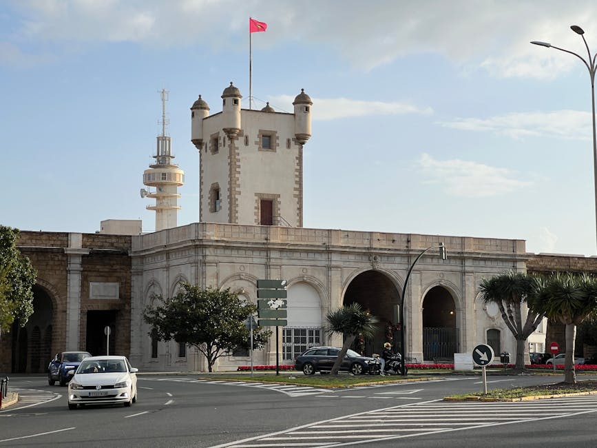 Charming historic architecture and tower in Cádiz, Spain capturing the blend of history and modernity.